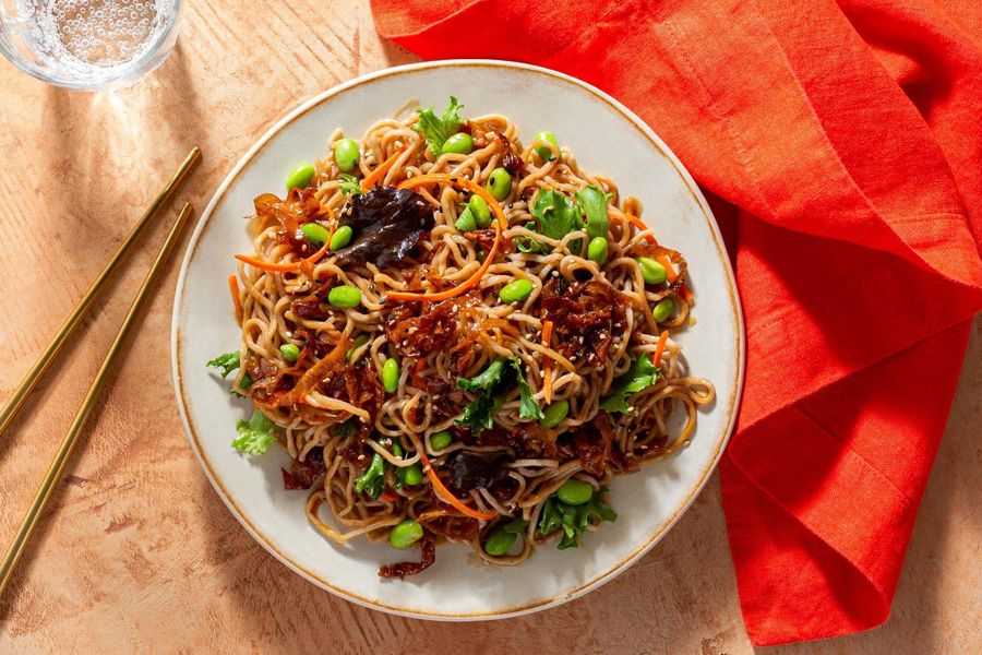 Sesame soba noodle bowl with yuba, edamame, and pickled carrots