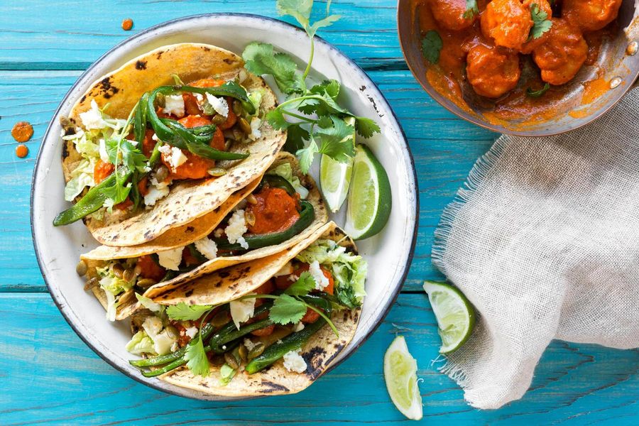 Shrimp tacos diablo with pickled cabbage and lime