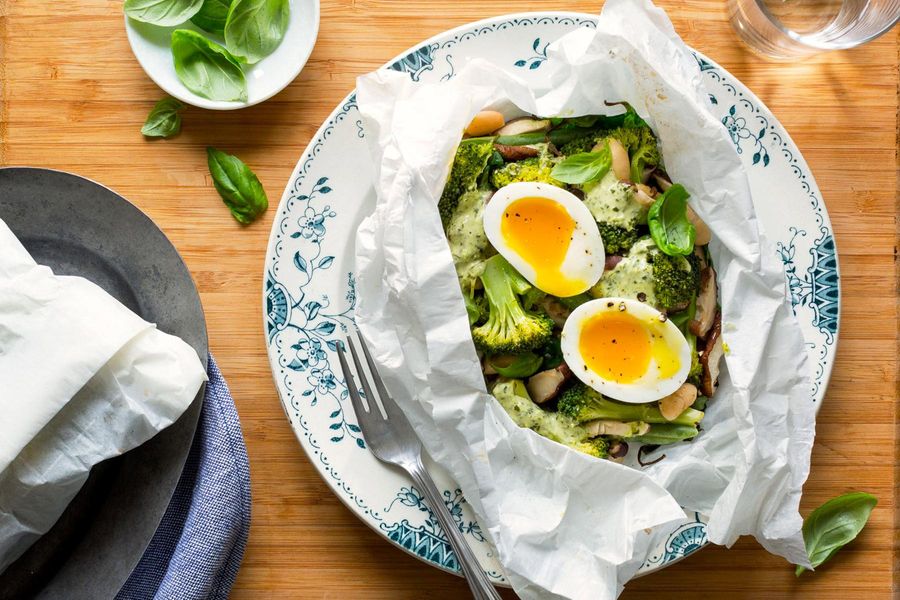 Vegetables in parchment with green goddess dressing and soft-cooked eggs