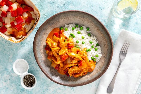 Thai chicken curry and jasmine rice with peas