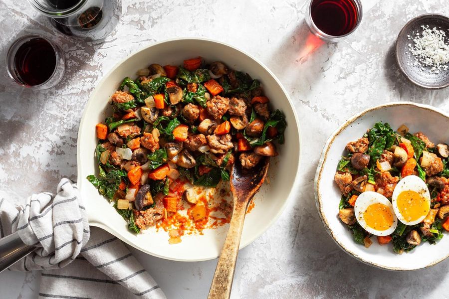 Italian sausage and vegetables in marinara with soft-cooked eggs