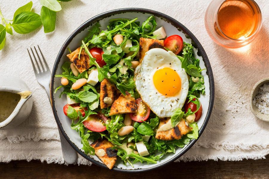 White bean panzanella with fresh mozzarella and fried eggs