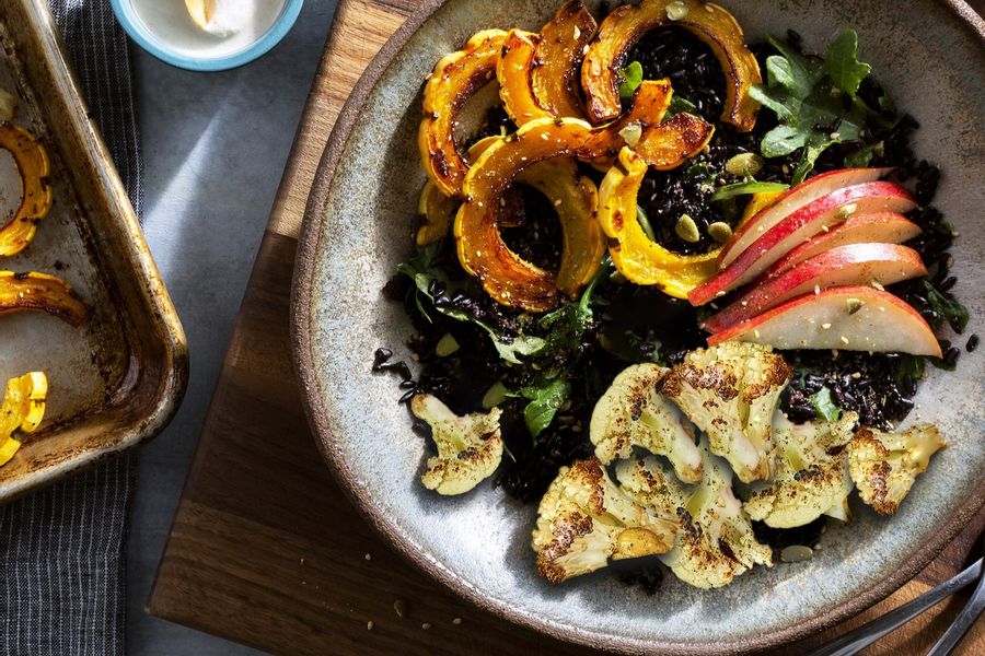 Black rice bowls with delicata squash, pear, and tahini dressing