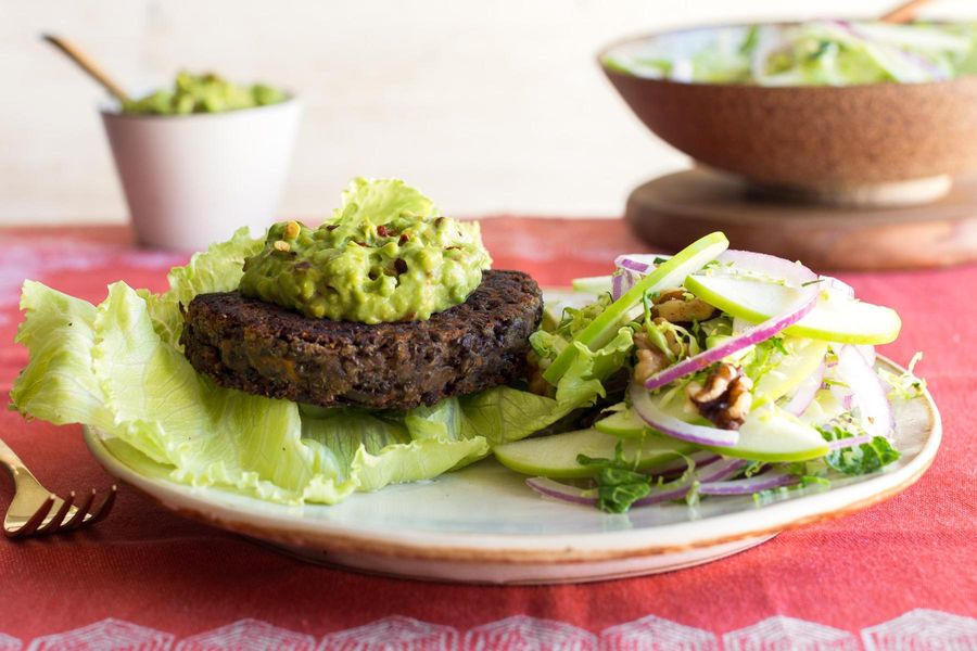 Lettuce-wrapped lentil burgers with avocado and Brussels sprout salad