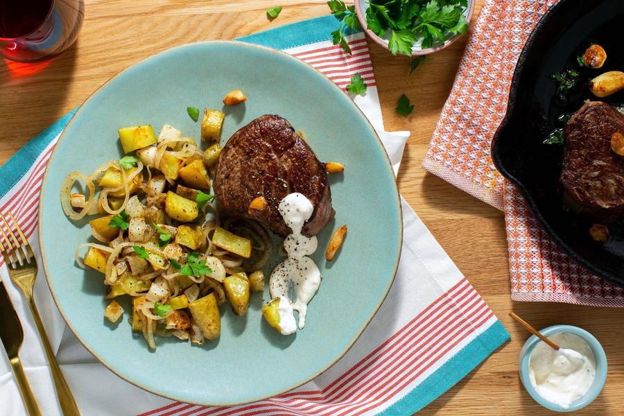 Filet mignons with roasted garlic, root vegetables, and lemon aioli