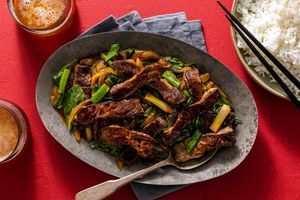 Mongolian beef and spinach stir-fry over steamed rice