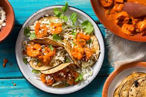 Shrimp tacos diablo with cabbage slaw and queso fresco