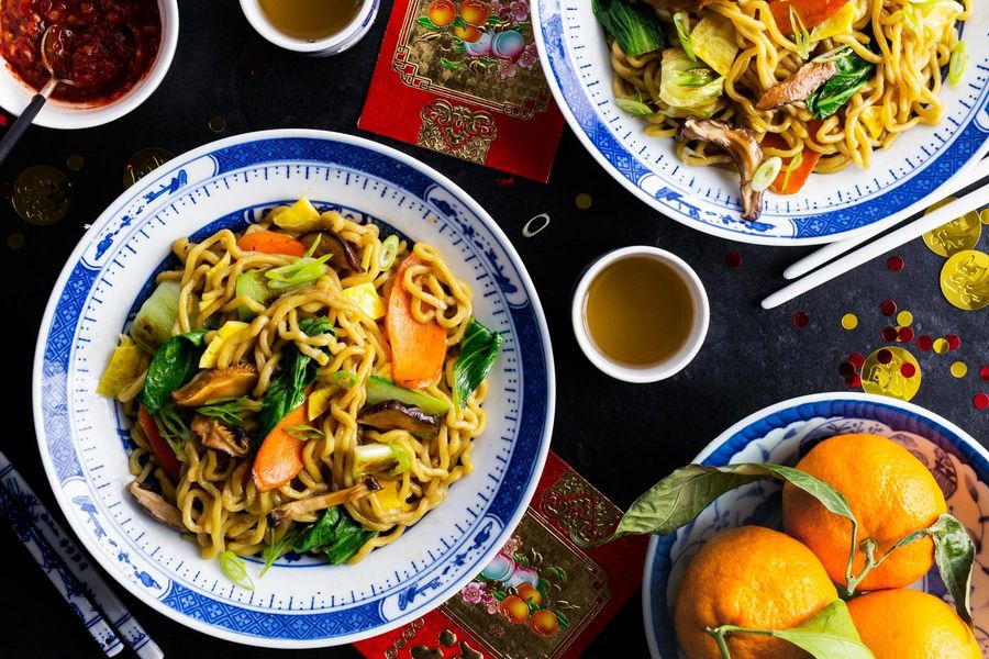Chinese long-life noodles with stir-fried bok choy and mushrooms