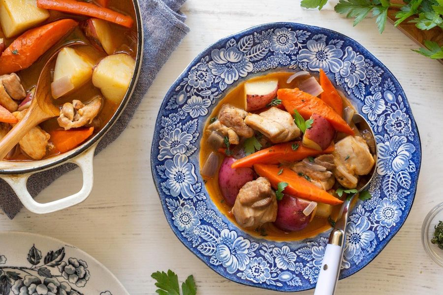 Braised chicken with carrots, potatoes, and thyme