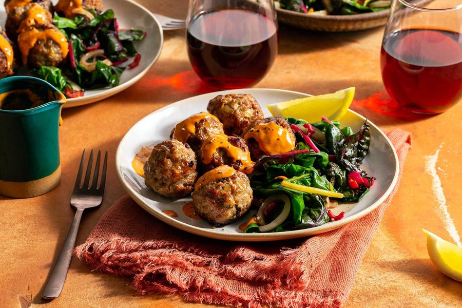 Mediterranean turkey meatballs with chard and red pepper–cashew crema