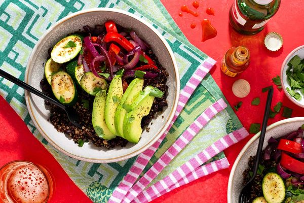 Black bean and quinoa Buddha bowls with zucchini and avocado