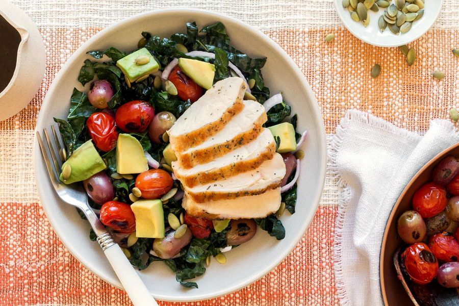 Chicken and kale salad with blistered grapes and tomatoes