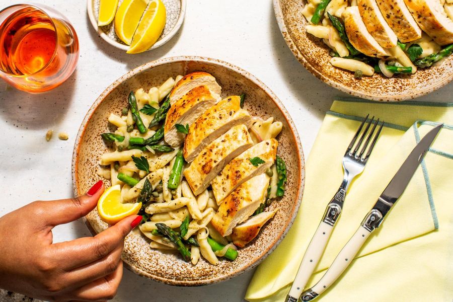 Mediterranean chicken over fresh ricotta cavatelli and asparagus