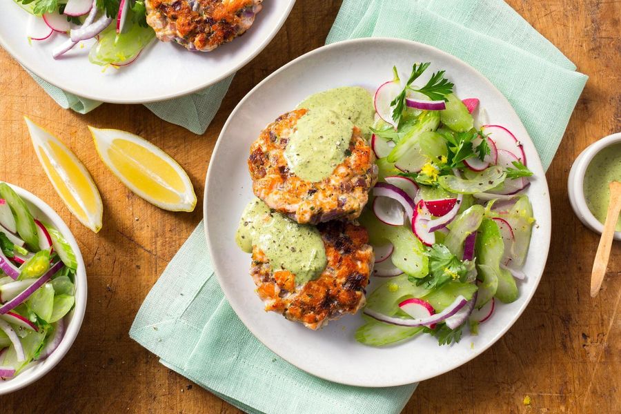 Salmon cakes with celery salad and tahini goddess dressing