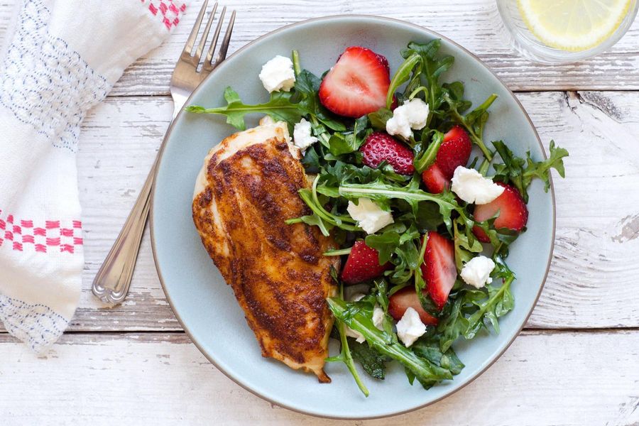 Roasted chicken with wild arugula, goat cheese and strawberries
