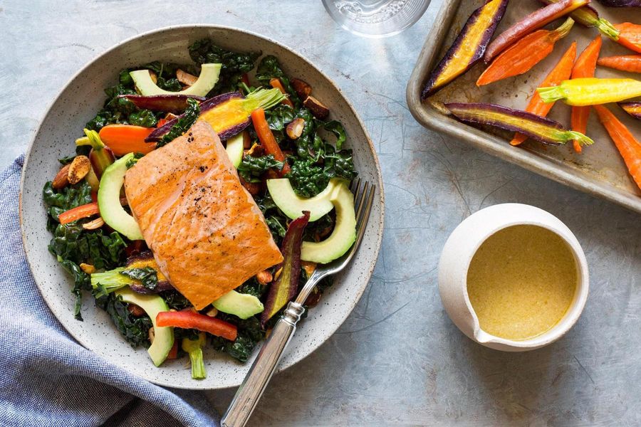 Salmon-kale salad with avocado and Moroccan-spiced almonds