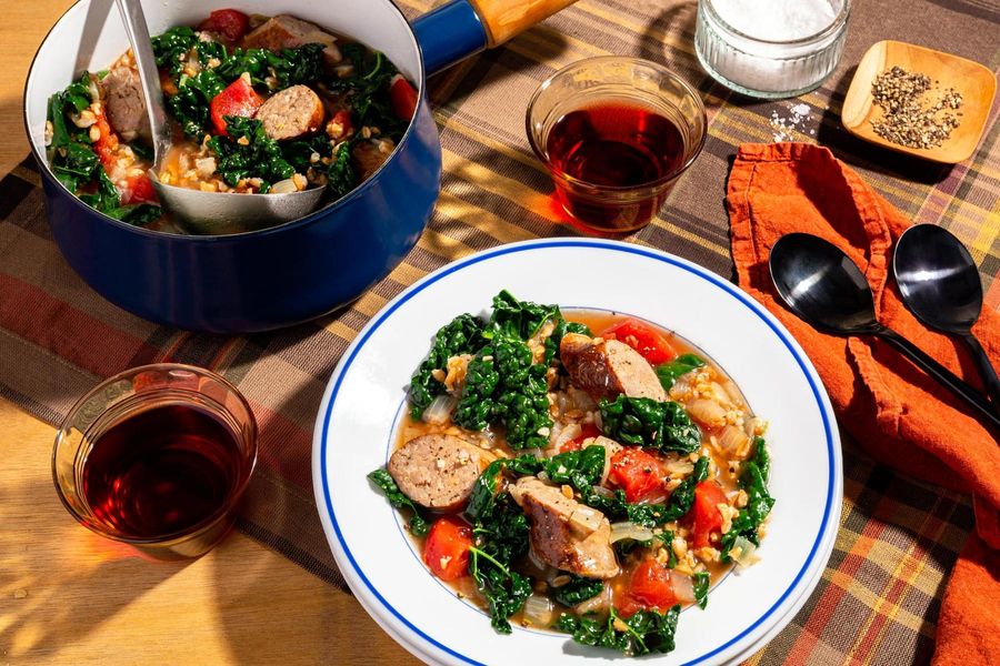 Farro soup with Italian sausages and kale