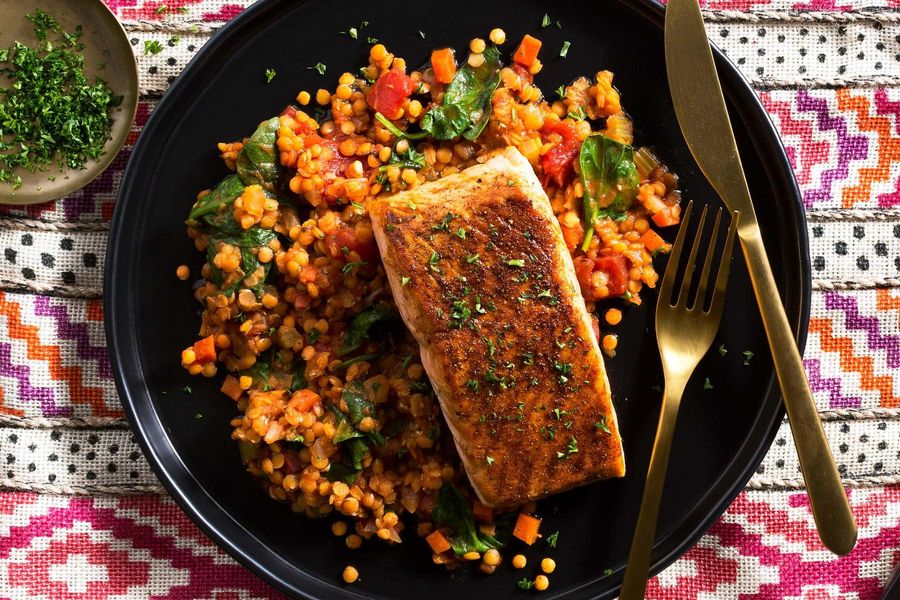 Moroccan-spiced king salmon with lentils, tomatoes, and baby spinach