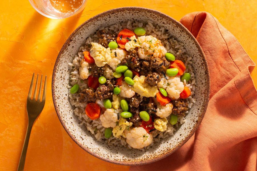 Beef donburi rice bowl with edamame and kimchi-lime vegetables