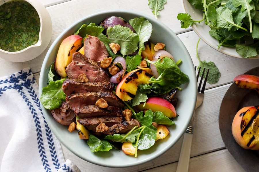 Summer steak and stone fruit salad with walnuts and ginger-basil dressing