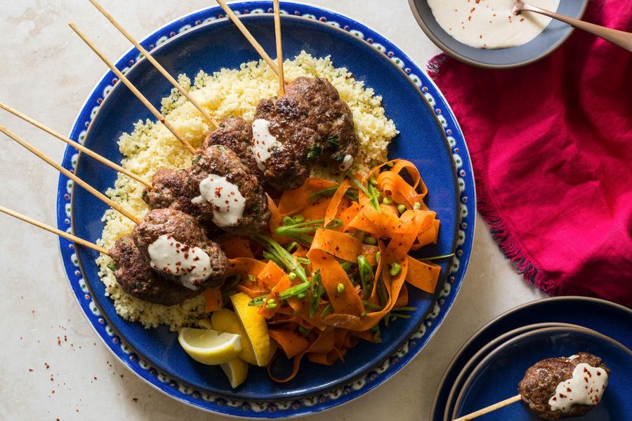 Turkey kebabs with carrot-snap pea salad and lemon couscous