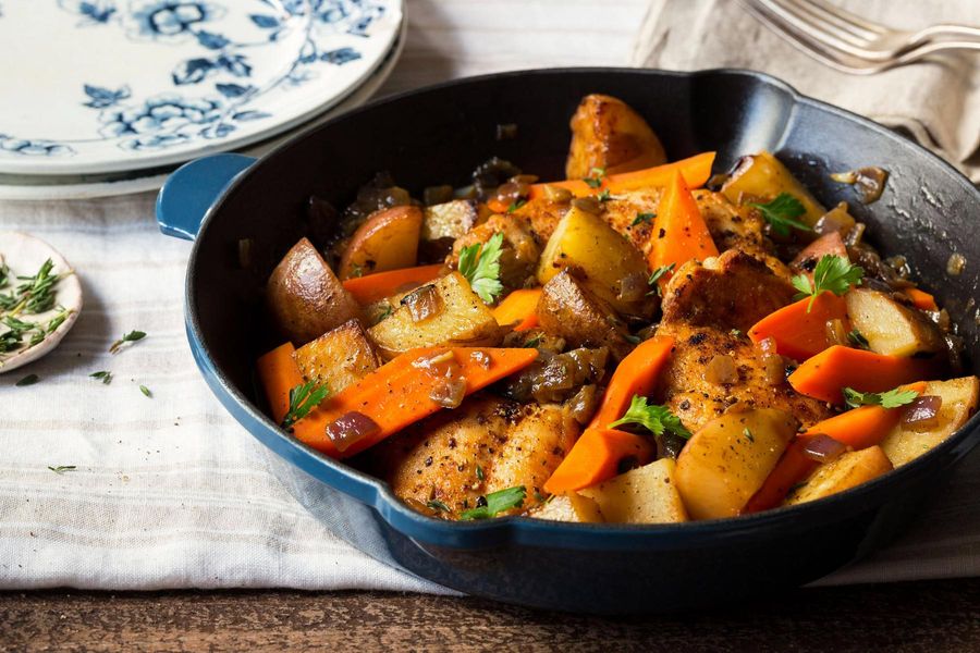 Braised chicken with carrots, potatoes, and thyme