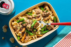 Beef stroganoff over egg noodles