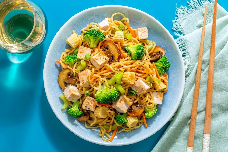 Chicken chow mein with broccoli, mushrooms, and toasted garlic