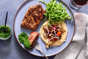 Black Angus steaks with chermoula, mushrooms, and hummus
