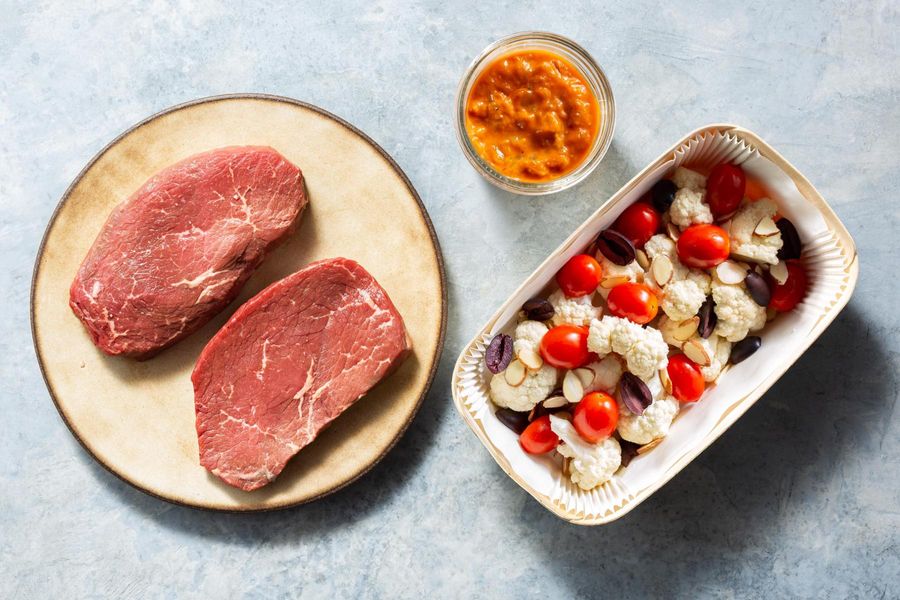 Seared steaks with roasted red pepper ajvar and cauliflower
