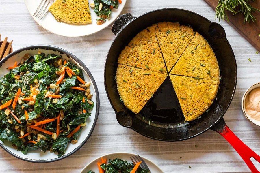 Socca with harissa yogurt and kale–Marcona almond salad