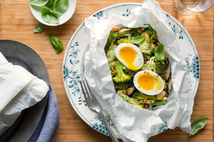 Vegetables in parchment with green goddess dressing and soft-cooked eggs