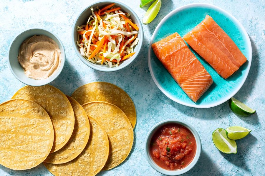 Salmon tacos with cabbage slaw, salsa roja, and chipotle yogurt