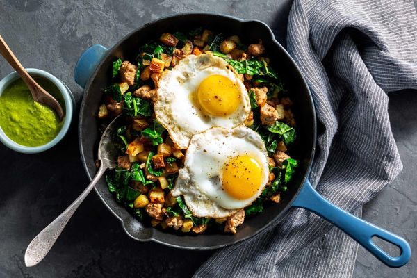 Turkey hash with runny eggs and spicy green harissa