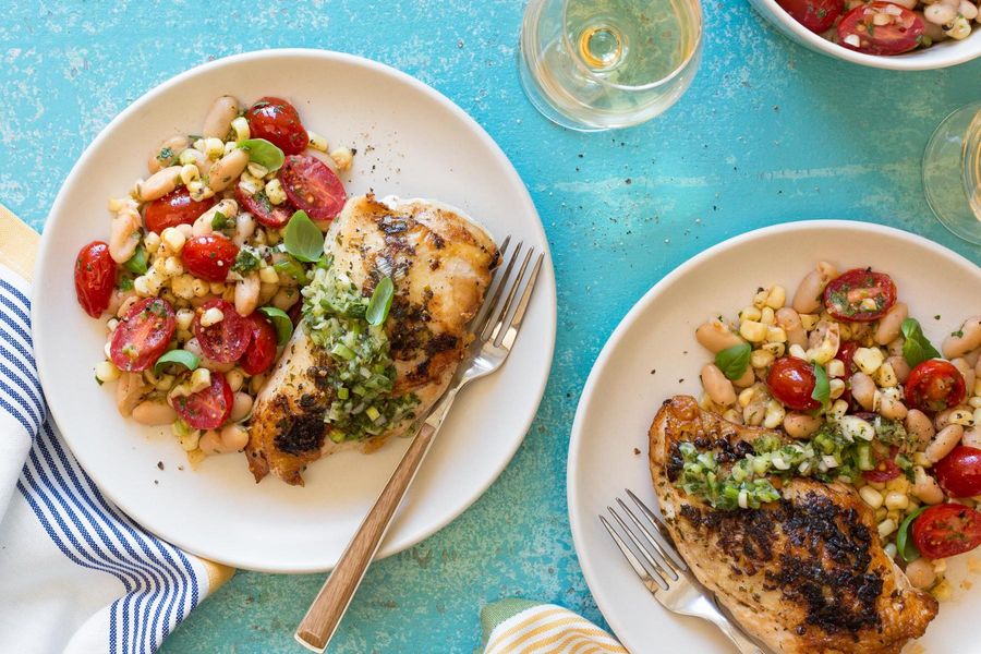 Seared chicken breasts with salsa verde and white bean salad