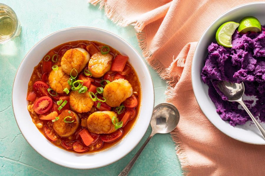 Brazilian moqueca with wild sea scallops over sweet potato mash