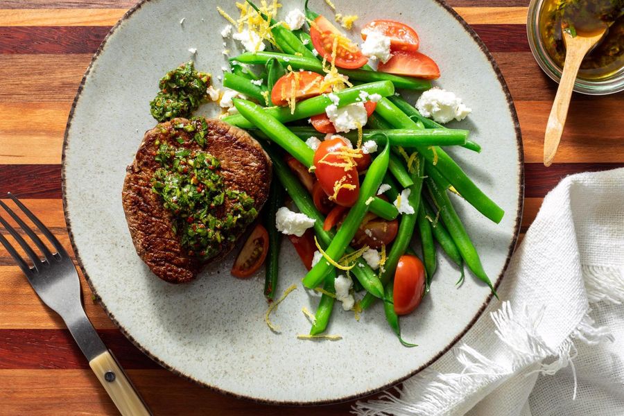 Filet mignons with arugula salsa verde and green bean–feta salad