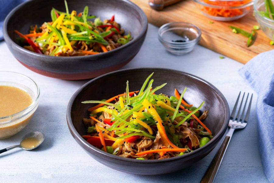 Spicy yuba noodle stir-fry with citrus-miso dressing and mango