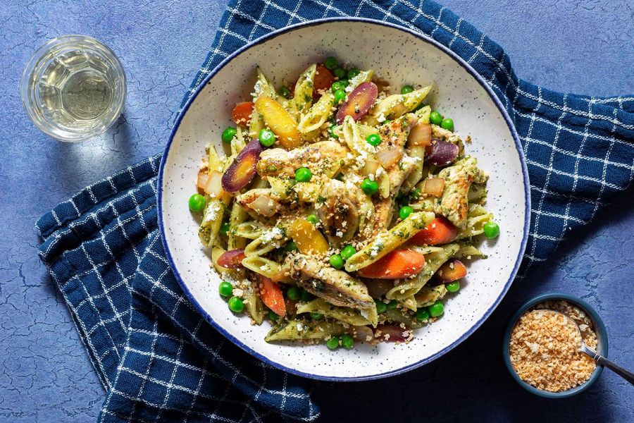 Chicken and penne casserole with carrots, peas, and ricotta