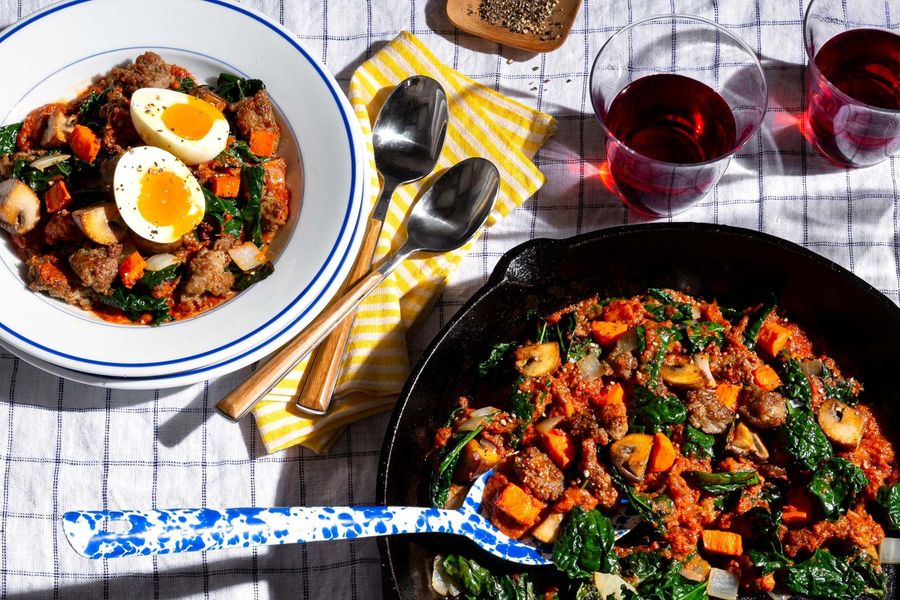 Italian sausage and vegetables in marinara with soft-cooked eggs