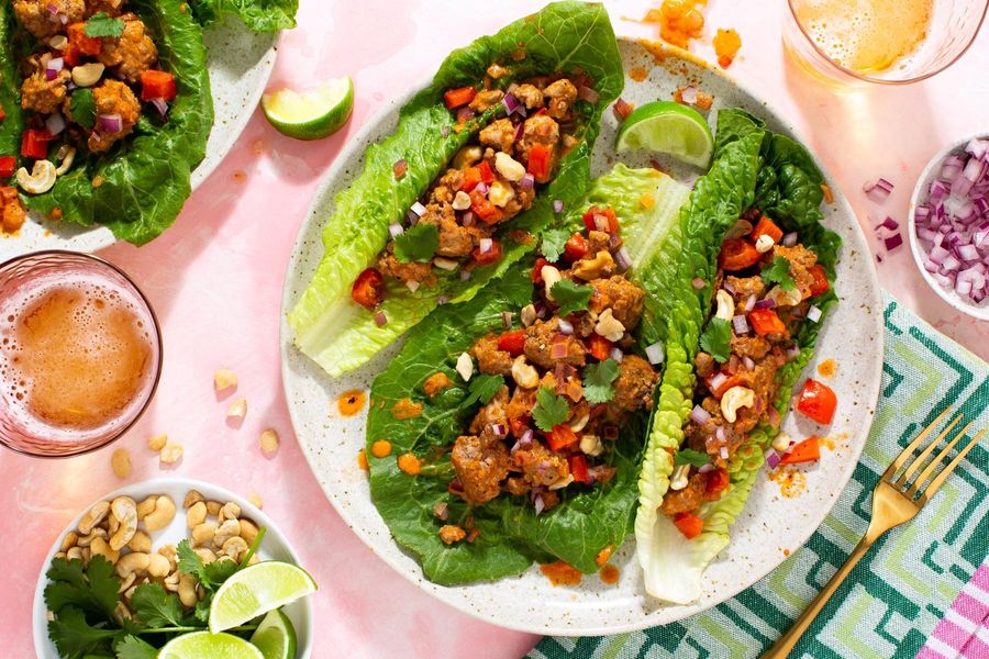 Thai lettuce cups with pork curry, crushed cashews, and fresh lime