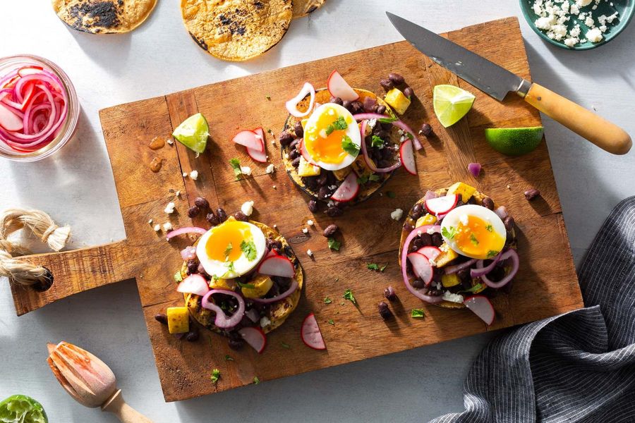 Black bean and summer squash tostadas with soft-cooked eggs