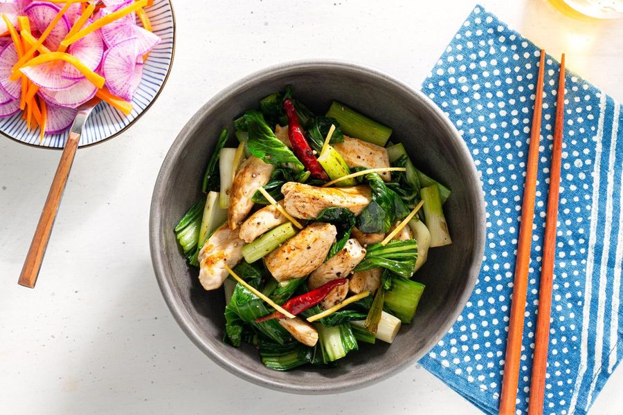 Ginger chicken and bok choy stir-fry with pickled daikon salad