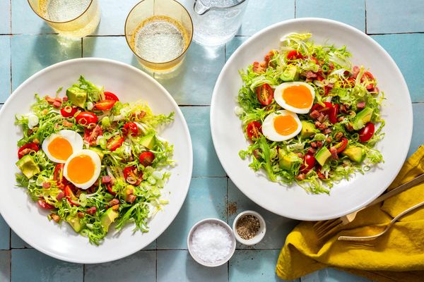 Frisée salad with pancetta, avocado, and soft-cooked eggs