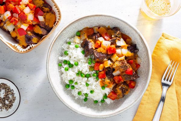 Braised beef panang curry with jasmine rice and sweet peas