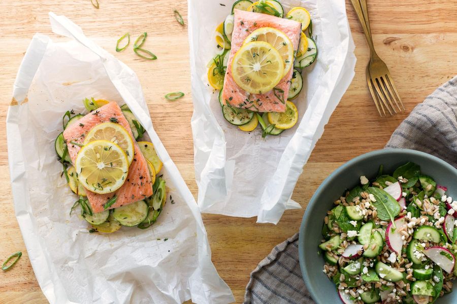 Salmon and summer squash in parchment with Mediterranean farro salad