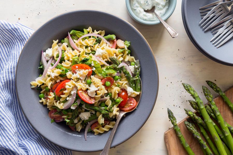 Gluten-free pasta salad with asparagus and parsley-yogurt dressing