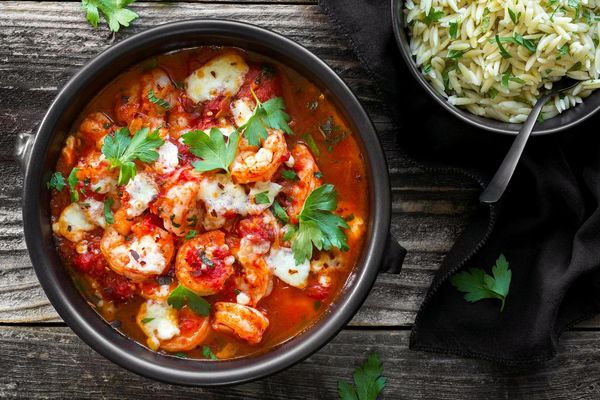 Baked shrimp with tomato, feta, and lemon-mint orzo