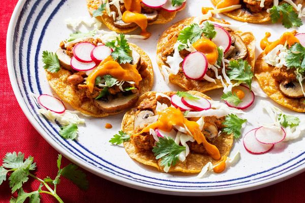 Mushroom tostadas with pinto beans and cabbage slaw