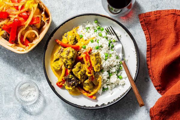 Braised beef panang curry with jasmine rice and sweet peas